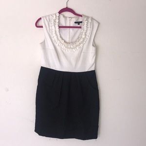 Dress with ruffle neckline and jacquard skirt